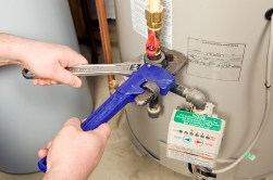 Stamps AR HVAC Tech installing water heater